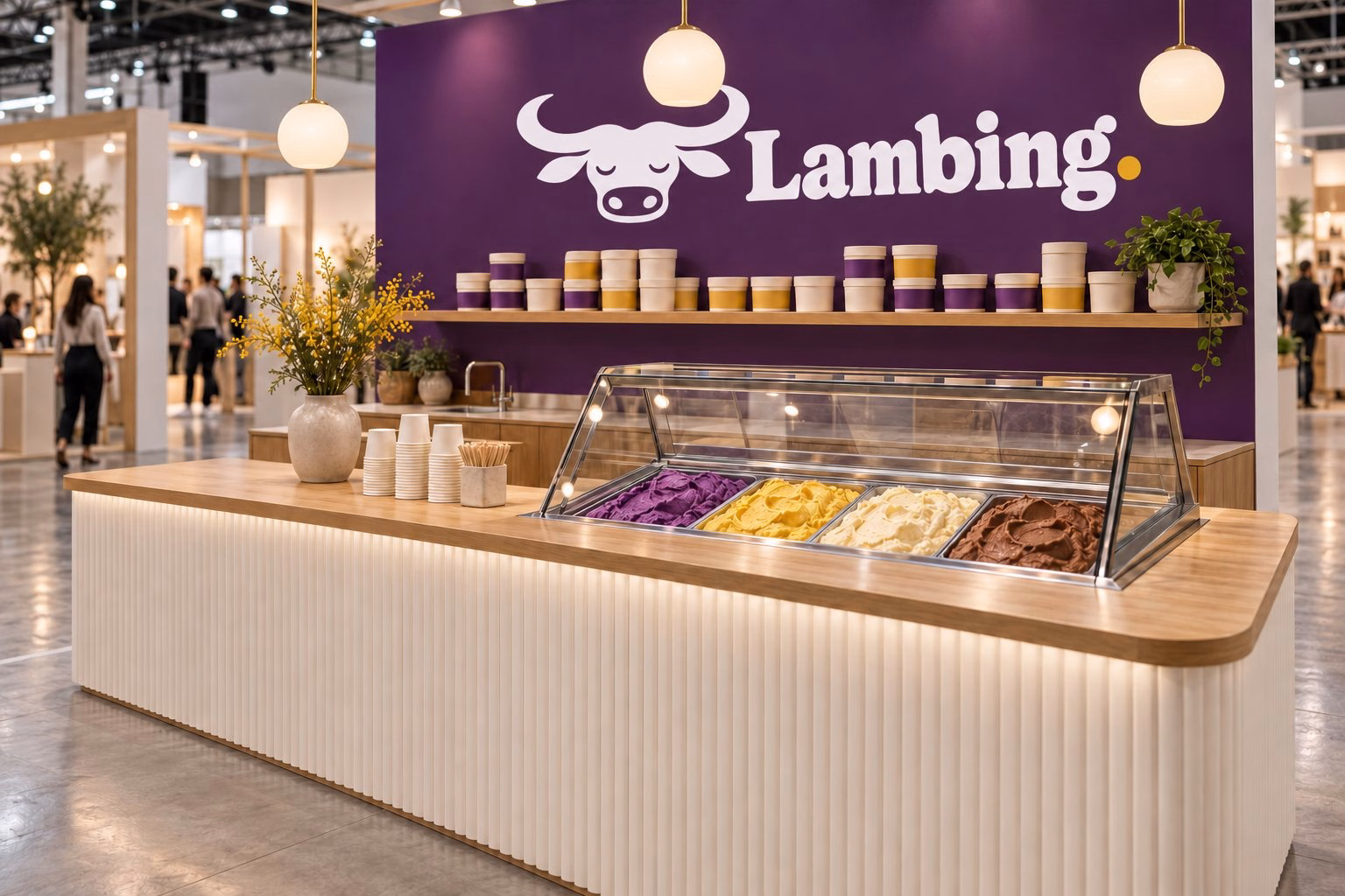 A timber pop-up ice cream counter with a lit ube back wall inside an expo hall