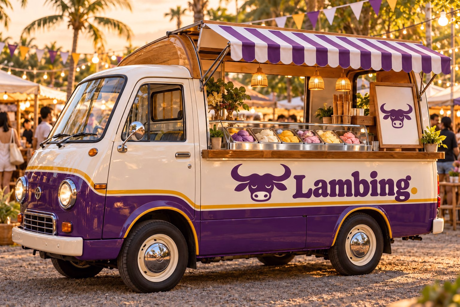 A white and ube Lambing ice cream truck with its serving hatch open at an outdoor bazaar